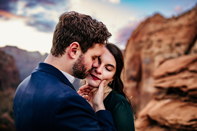 Couples Photographer, two people in love hold each other closely in the wilderness