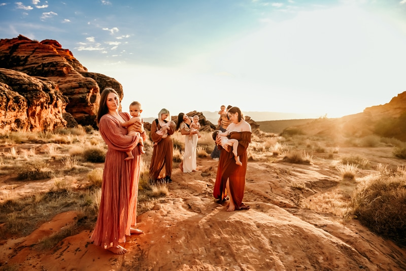 Motherhood Photographer, five mothers stand in the desert holding their babies