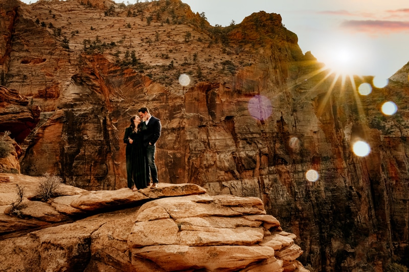 Elopement Photographer, newly married husband and wife hold each other before Utah wilderness