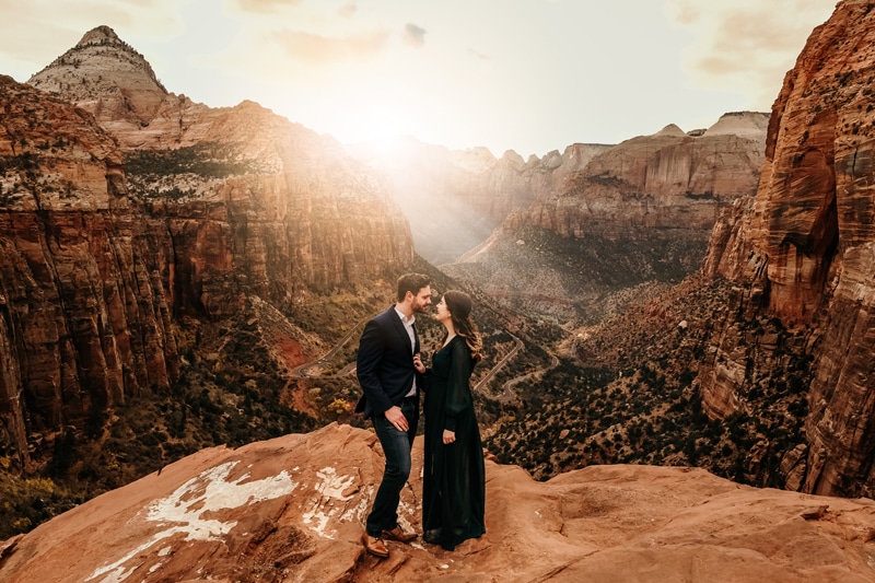 Elopement Photographer, man and woman smile nose to nose before Zion