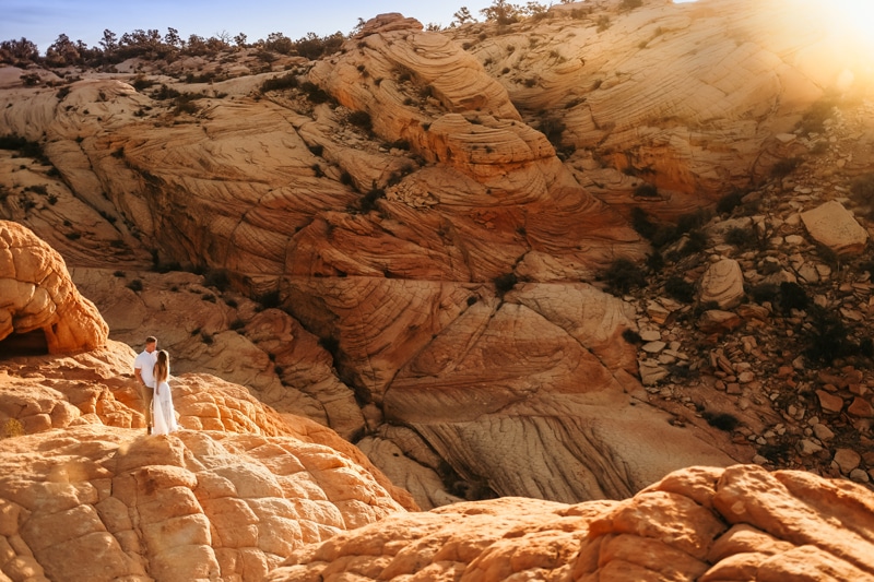 Elopement Photographer, bride and groom gaze into each others eyes in Utah Canyons